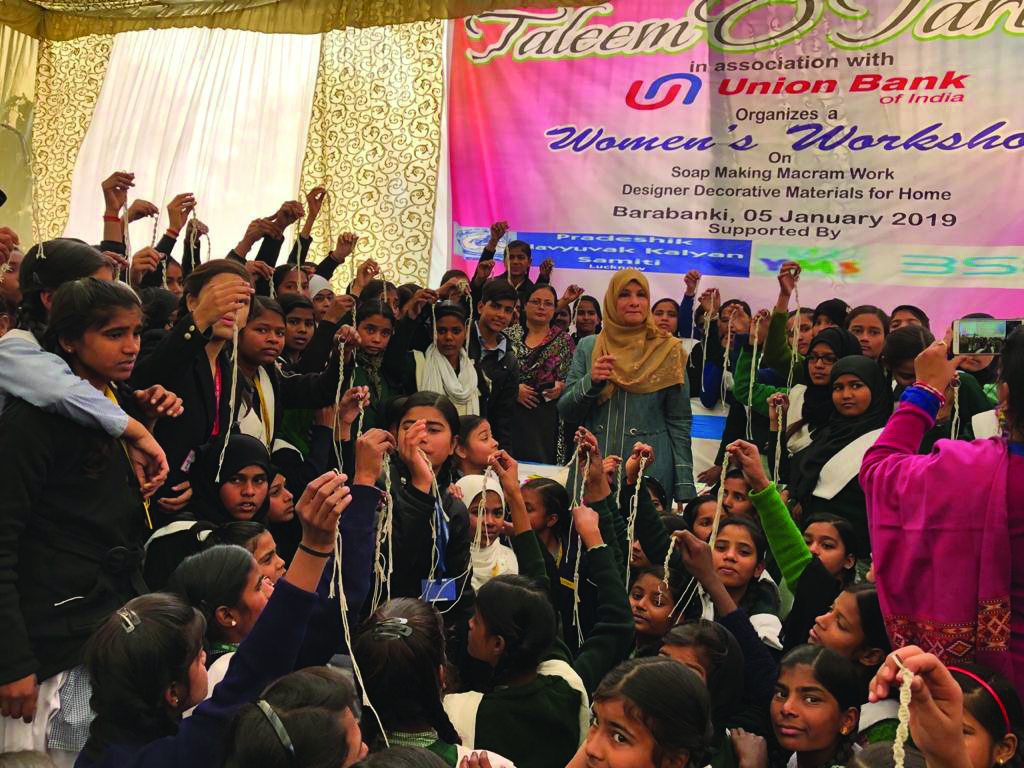 Women demonstrating their craft work at a Taleem-o-Tarbiyat workshop